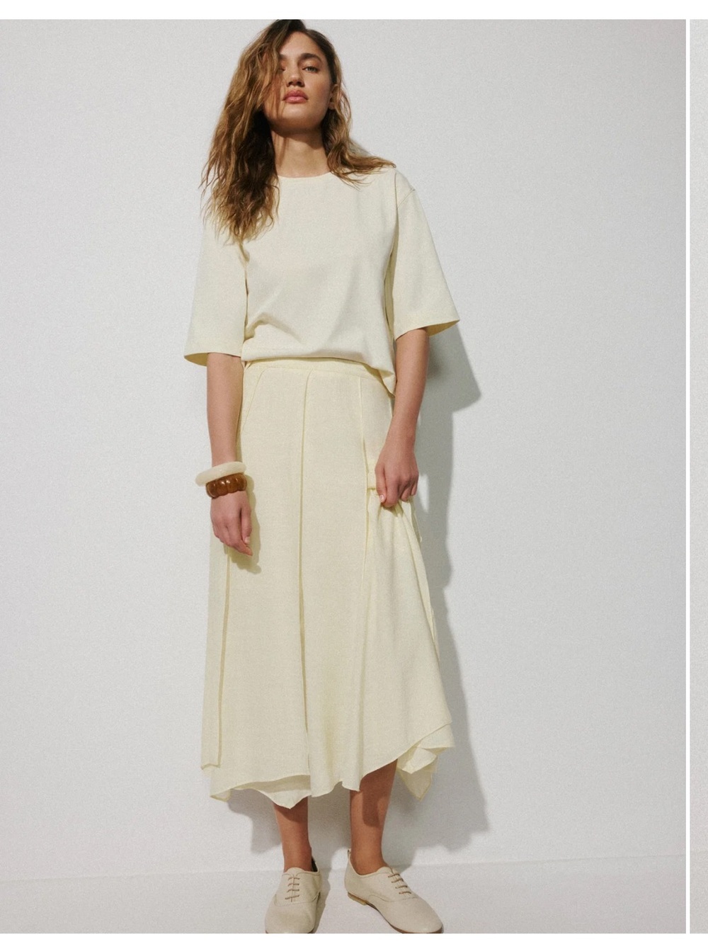 RW&CO. Pale Yellow Asymmetric Midi Skirt - Picture 2 of 9